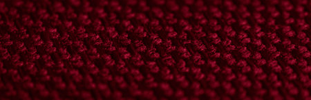 red material with visible slot textureの写真素材