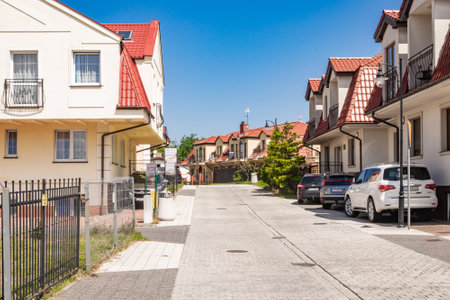 Ustka, Poland - 25/06/2024 - street with new buildings in Ustkaのeditorial素材