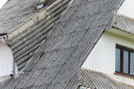 roof covered with gray asbestos tilesの写真素材