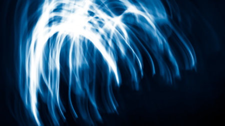blue and white lines of light on a black background