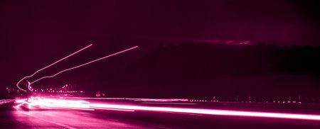 violet car lights at night. long exposureの写真素材