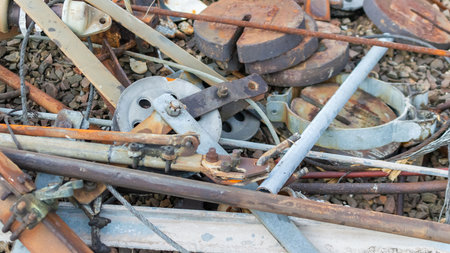steel railway scrap lying on the ground