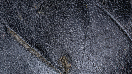 black natural leather with visible details. background