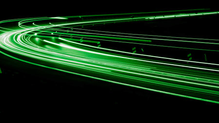 green car lights at night. long exposureの写真素材