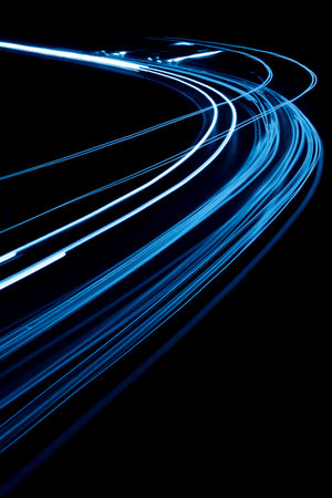 blue car lights at night. long exposure
