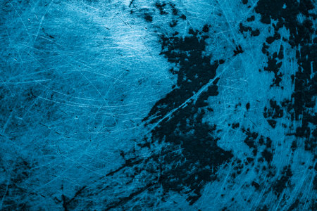 blue old aluminum sheet with burnt marks from the panの写真素材