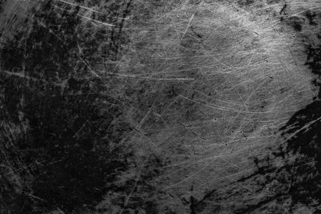 black old aluminum sheet with marks from the panの写真素材