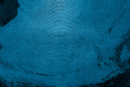 blue old aluminum sheet with burnt marks from the pan