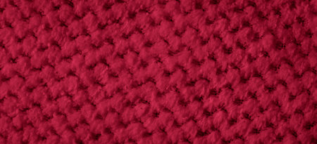 red braided material with an interesting pattern