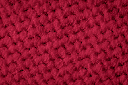 red braided material with an interesting pattern