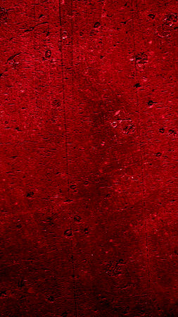 wall painted with red paint with an interesting textureの写真素材