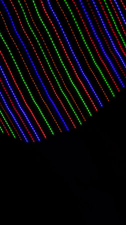 colored lines on a black background.texturaの写真素材