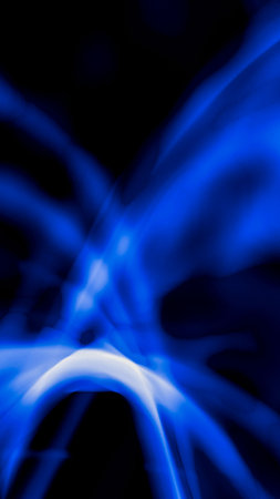 Abstract blue lines on a black backgroundの写真素材