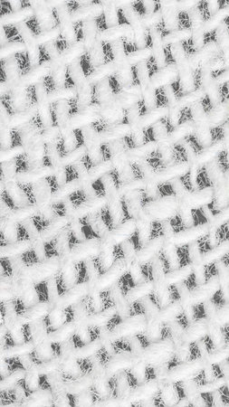 white cotton material with visible details. texture or backgroundの写真素材