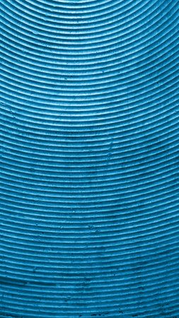 blue old aluminum sheet with burnt marksの写真素材