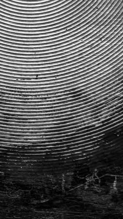 black old aluminum sheet with burnt marksの写真素材