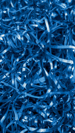 blue steel shavings with visible details. background or textureの写真素材