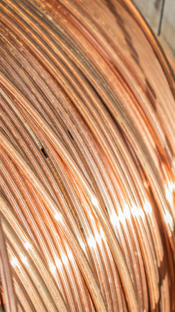 copper cord on a wooden drumの写真素材