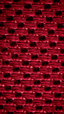 red fabric with a visible texture. backgroundの写真素材