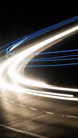 lights of moving cars at night. long exposure