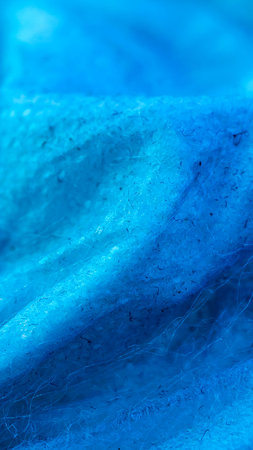 creased blue cotton fabric. backgroundの写真素材