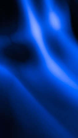 Abstract blue lines on a black backgroundの写真素材
