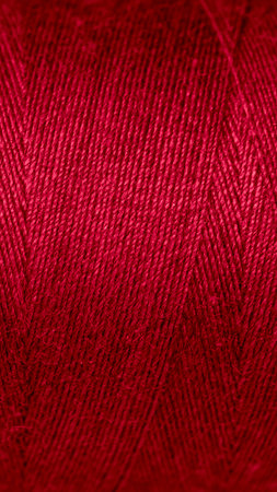 red cotton threads with visible details. background