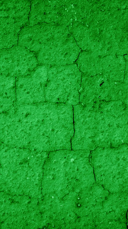 macro photo of green brick with visible texture.