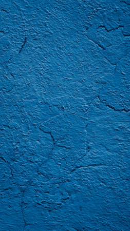 the wall is painted blue with visible detailsの写真素材
