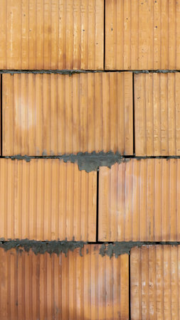 A wall made of hollow bricks. Background