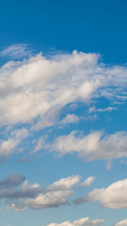 white nice clouds on a background of blue skyの写真素材