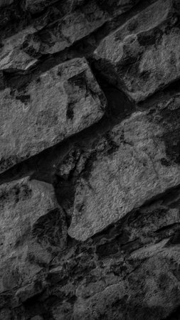 black limestone rock with visible details. background or texture