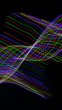 colored lines on a black background. textureの写真素材