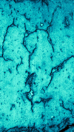 macro photo of blue brick with visible texture.の写真素材