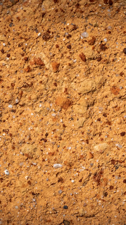 macro photo of an orange brick with visible texture.の写真素材