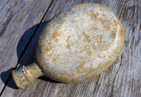 Old flask of the soldier for potable wateの写真素材