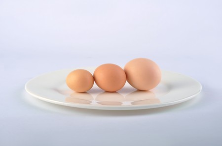 Three eggs on the plateの写真素材