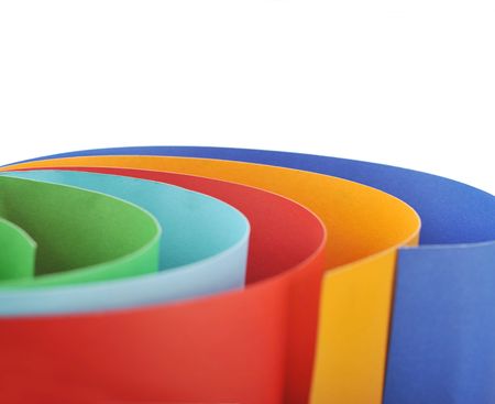 Colored rolled paper in white backgroundの写真素材
