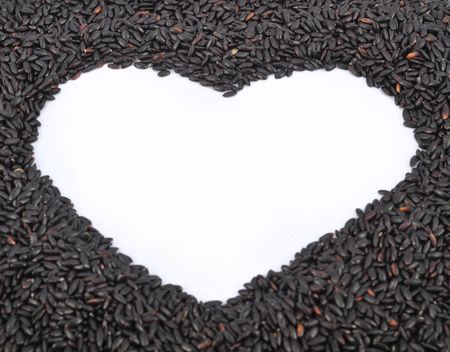 Brown rice heart shapeの写真素材