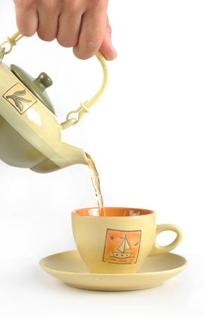 indoor photography, pours water the teacupの写真素材