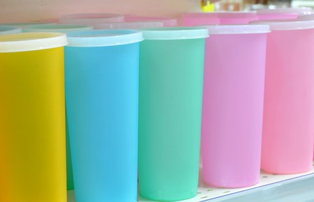 Supermarket shelves with plastic cups の写真素材