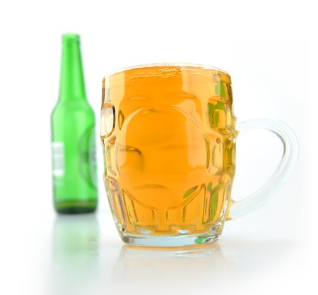 A glass of beer and bottleの写真素材