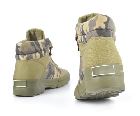 Camouflage cloth shoes in white backgroundの写真素材