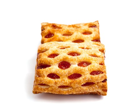 Puff cookies with jam on a white backgroundの写真素材