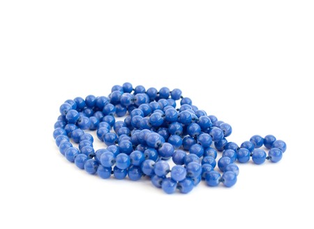 blue beads on a white backgroundの写真素材