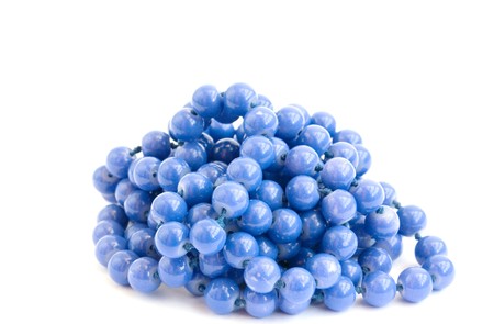 blue beads on a white backgroundの写真素材