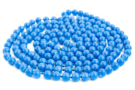 blue beads on a white backgroundの写真素材