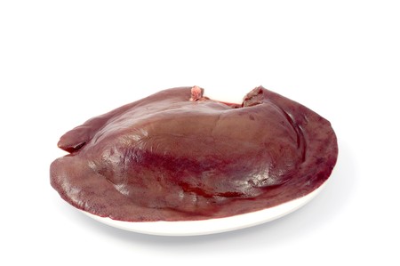 liver in a plate on a white backgroundの写真素材