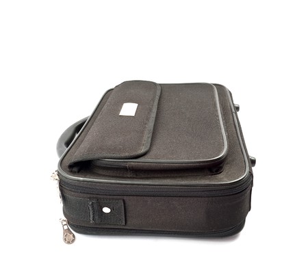 Black suitcase on a white backgroundの写真素材