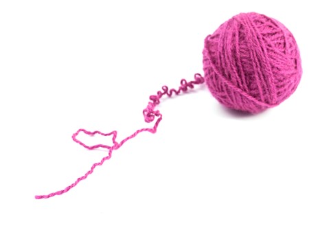 a ball of yarn on white backgroundの写真素材